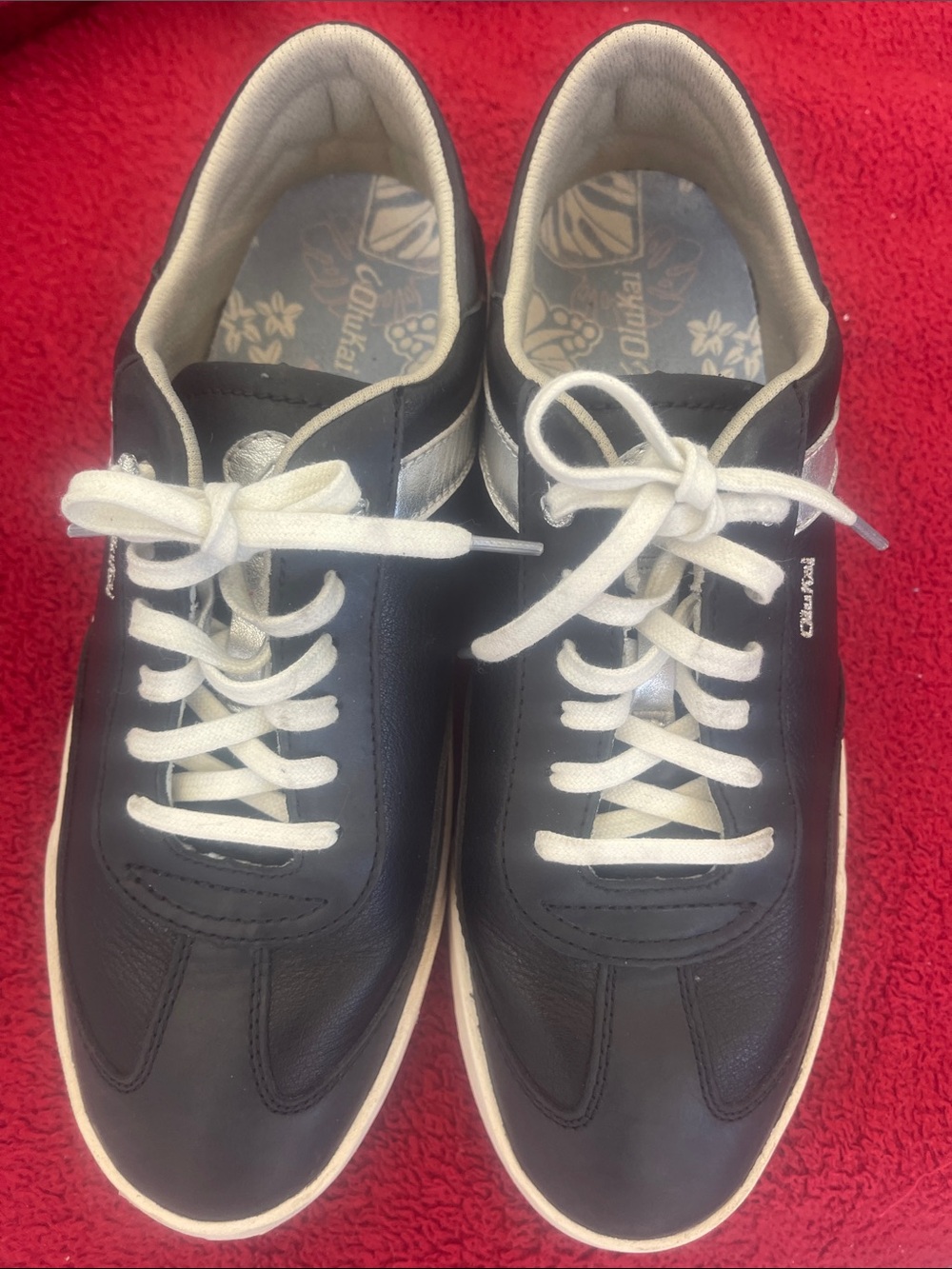 OluKai Lae’ahi Li’lli Leather Black & White Low-Top Lace-Up Sneakers